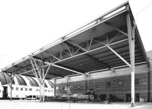 Building with large overhang cover
